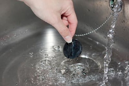 Drain cleaning vs drain snaking which fix actually lasts